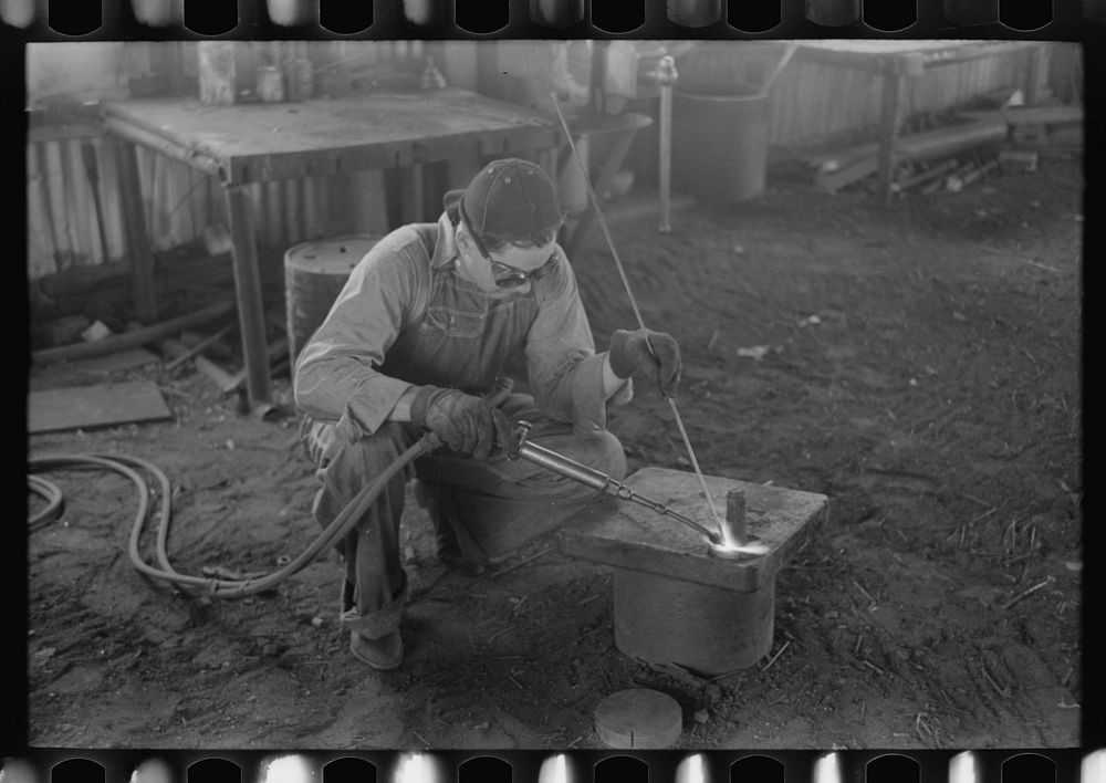 Acetylene welding, a necessary part of oil field activities, Seminole, Oklahoma by Russell Lee