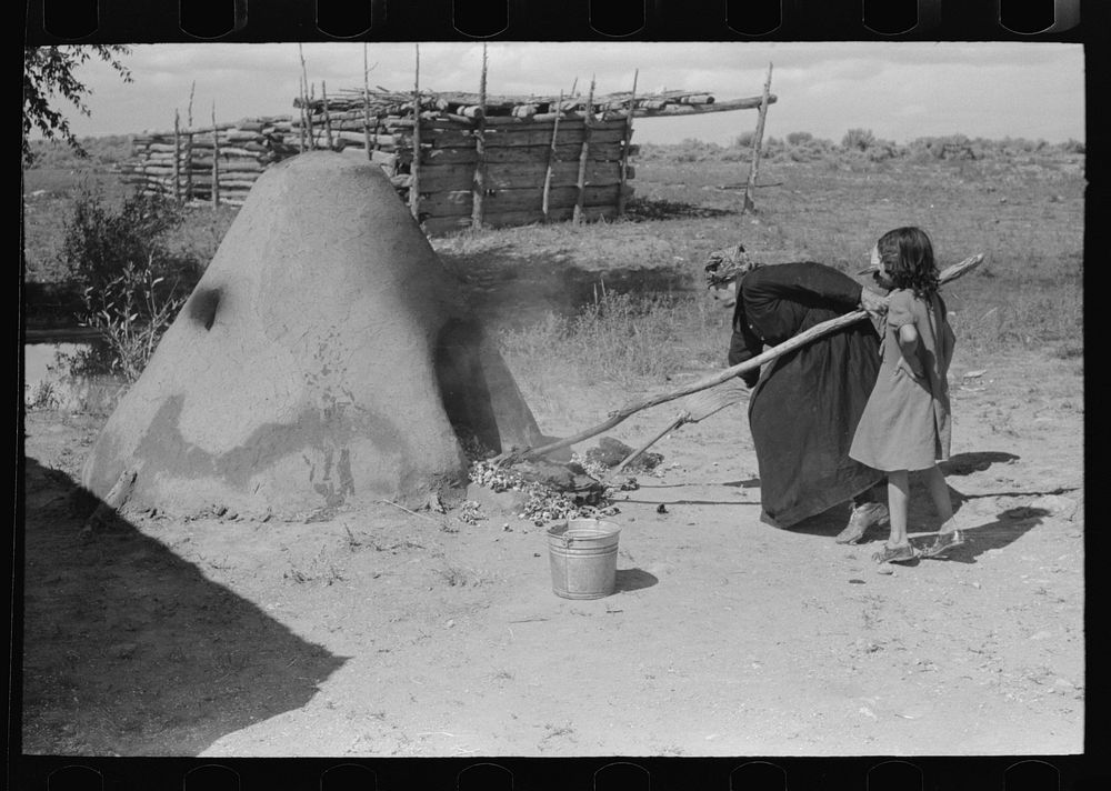 General view of oven for bread baking on Spanish-American farm in Taos County, New Mexico by Russell Lee