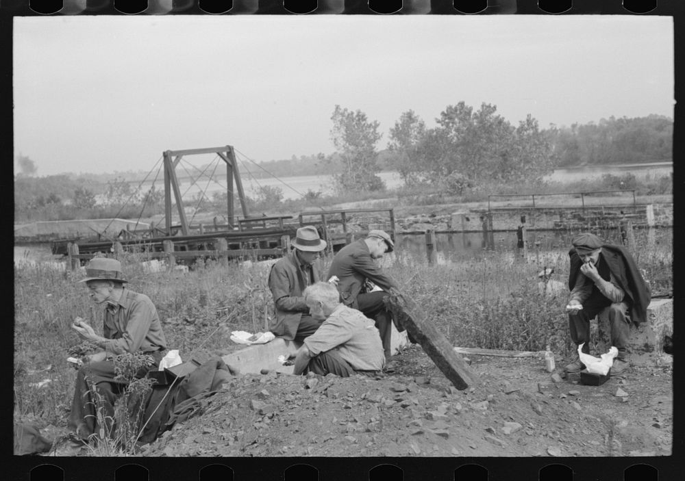 Railroad workers eating lunch, Windsor Locks, Connecticut by Russell Lee