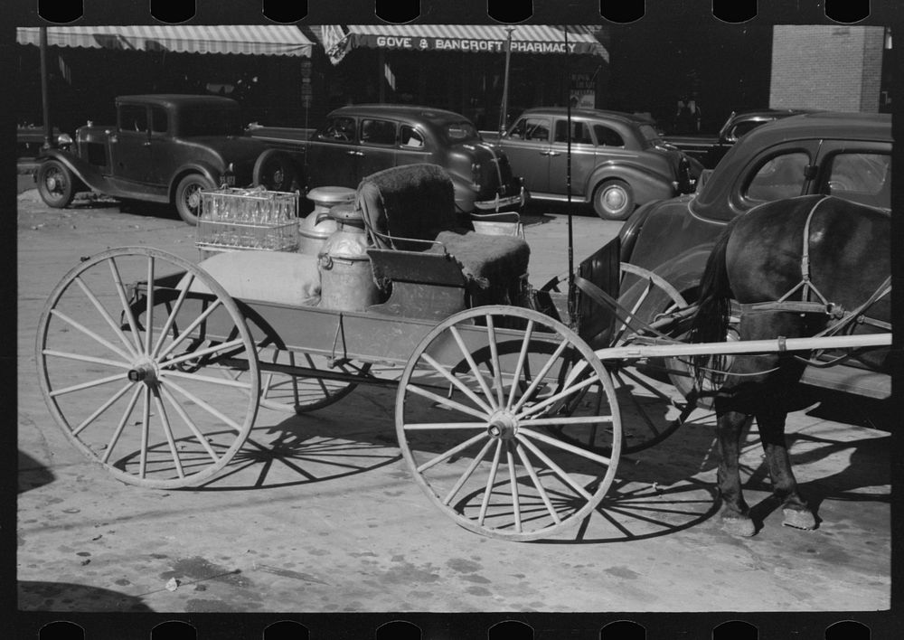 [Untitled photo, possibly related to: Farmer's wagon in town, Bradford, Vermont] by Russell Lee