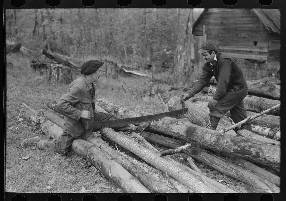 Farmers sawing wood near Bradford, Vermont by Russell Lee
