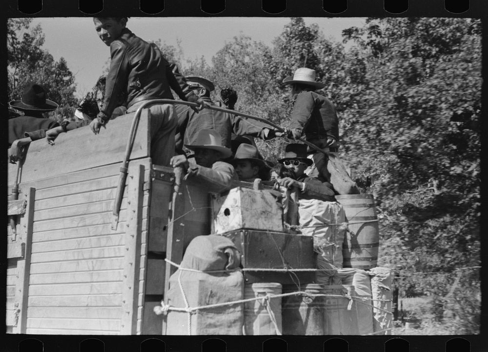 [Untitled photo, possibly related to: Truckload of Mexican migrants returning from Mississippi where they had been picking…