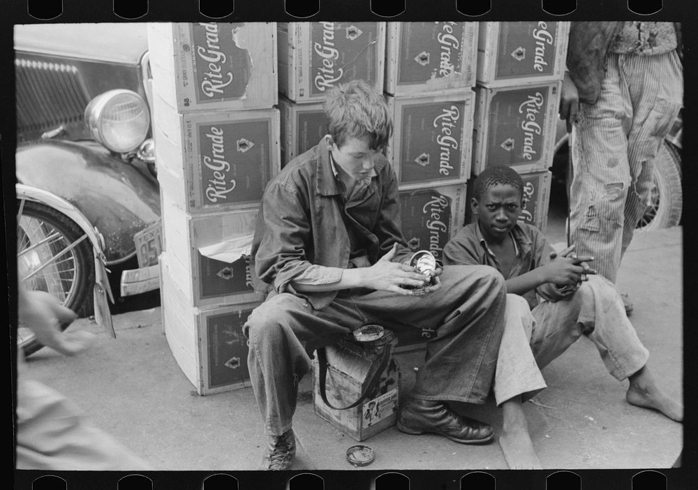 Boys boots in Market Square, Waco, Texas by Russell Lee