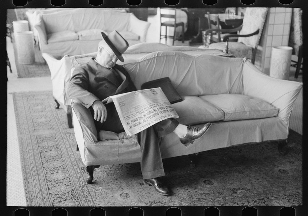 [Untitled photo, possibly related to: Man asleep in hotel lobby, Taylor, Texas] by Russell Lee