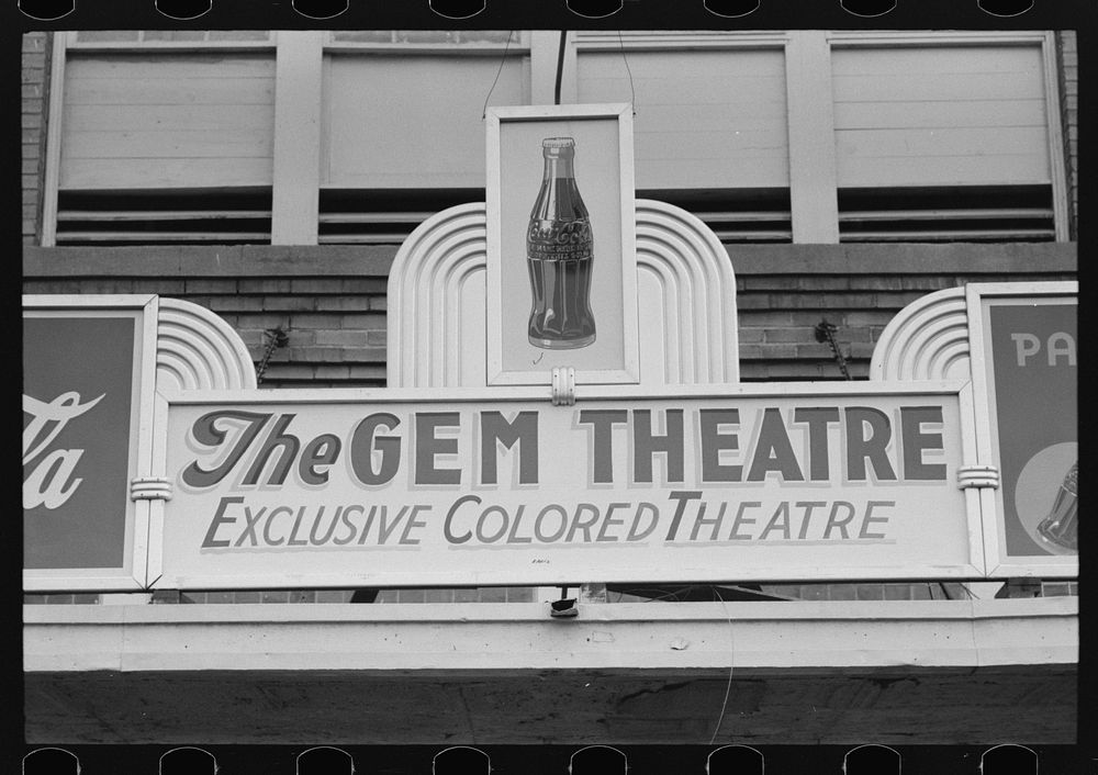 Sign above moving picture theater, Waco, Texas by Russell Lee