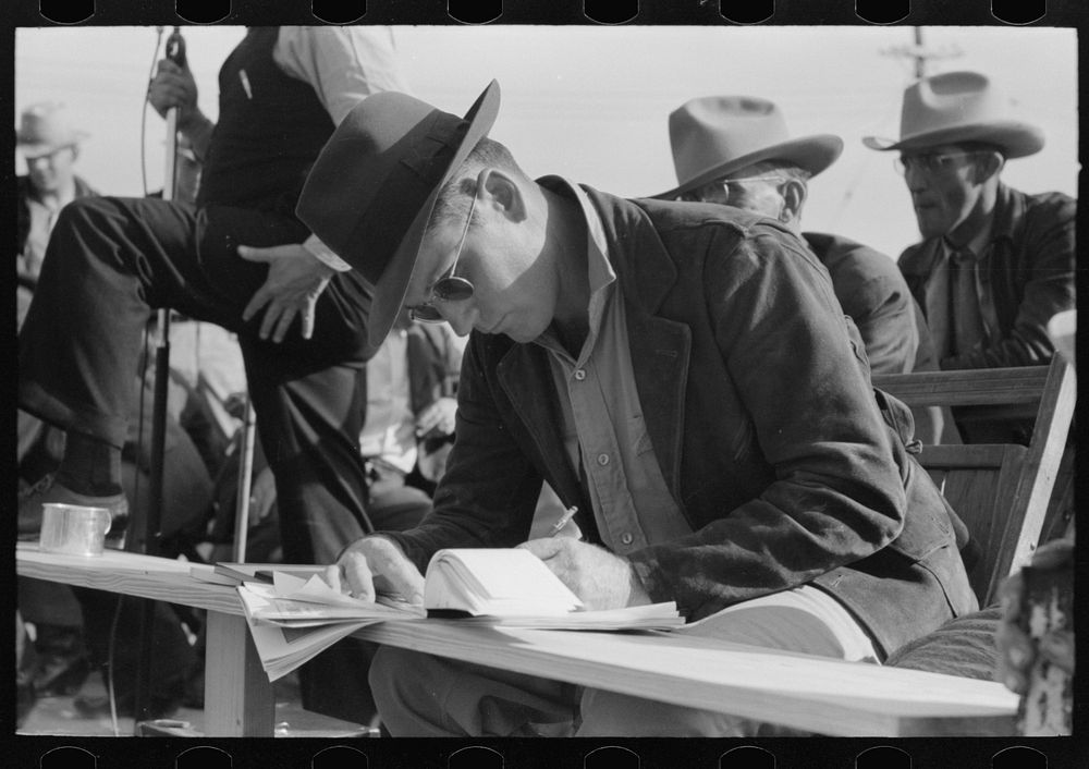 Clerk at horse auction, Eldorado, Texas by Russell Lee