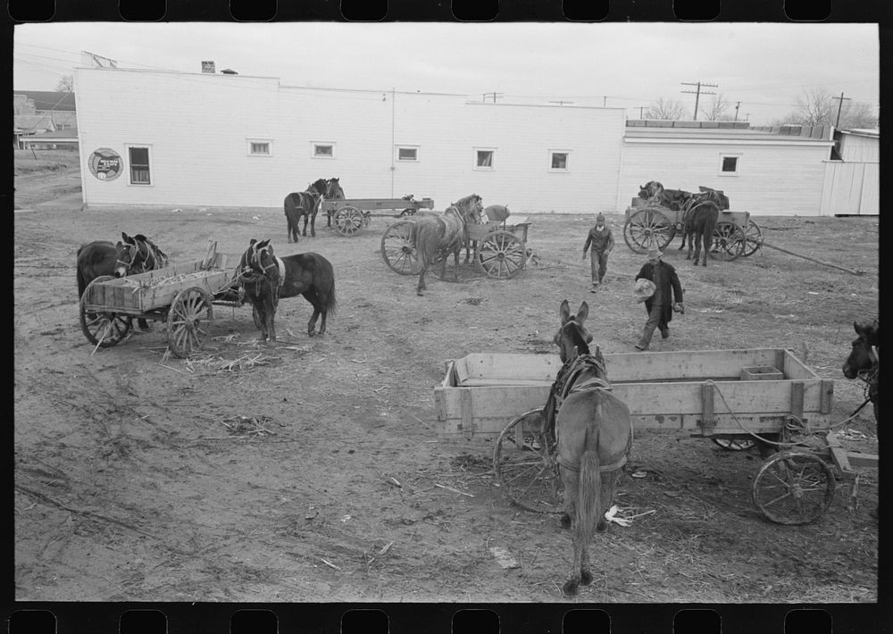 Lot in which farmers leave their wagons and horses while attending to do business in Eufaula, Oklahoma by Russell Lee