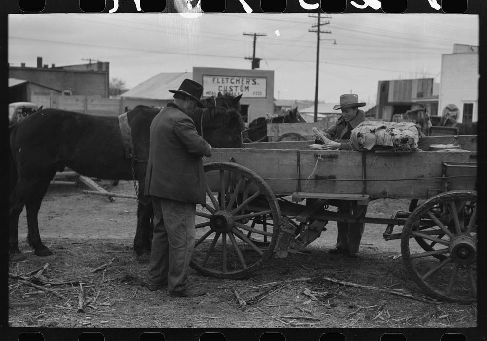 [Untitled photo, possibly related to: Lot in which farmers leave their wagons and horses while attending to do business in…