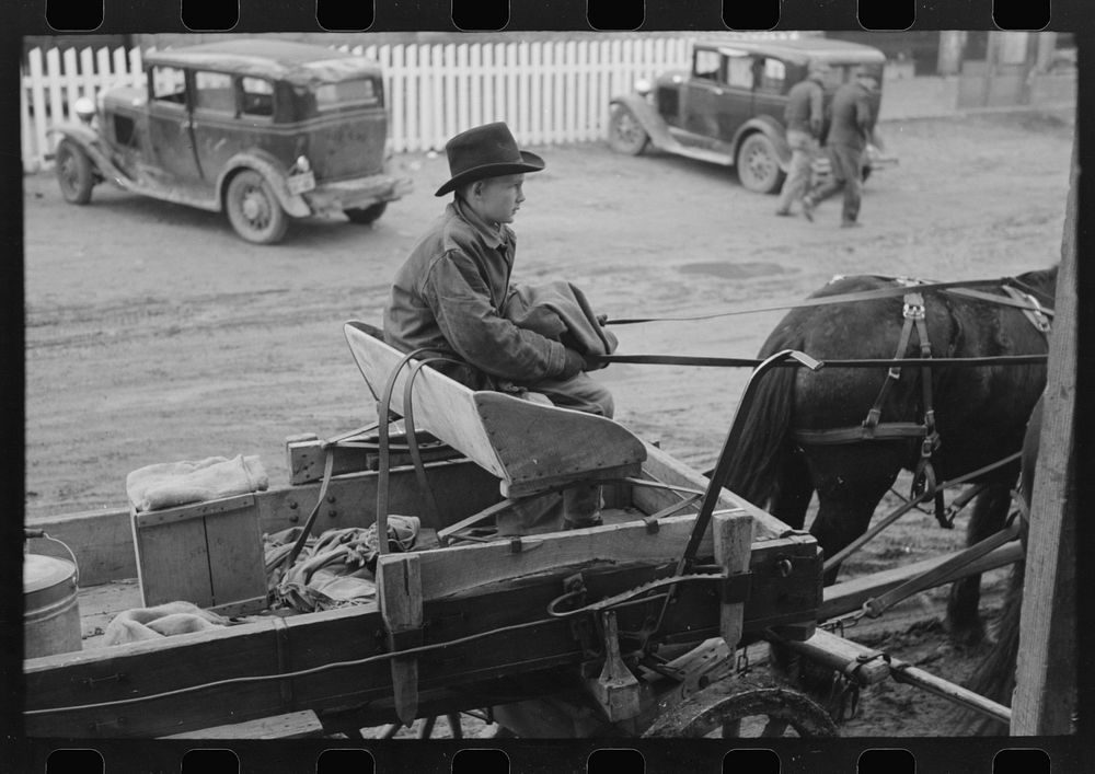 [Untitled photo, possibly related to: Farmer and son arriving in town in wagon, Eufaula, Oklahoma] by Russell Lee