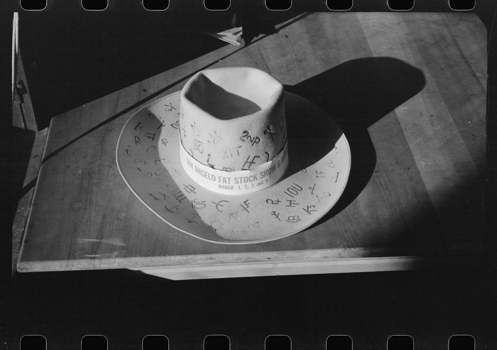 [Untitled photo, possibly related to: Hat with cattle brands burned into it, San Angelo, Texas] by Russell Lee