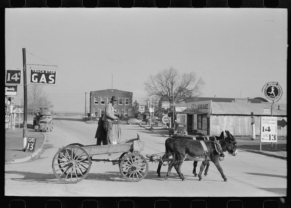 Farmer crossing the main street of town, Eufaula, Oklahoma by Russell Lee
