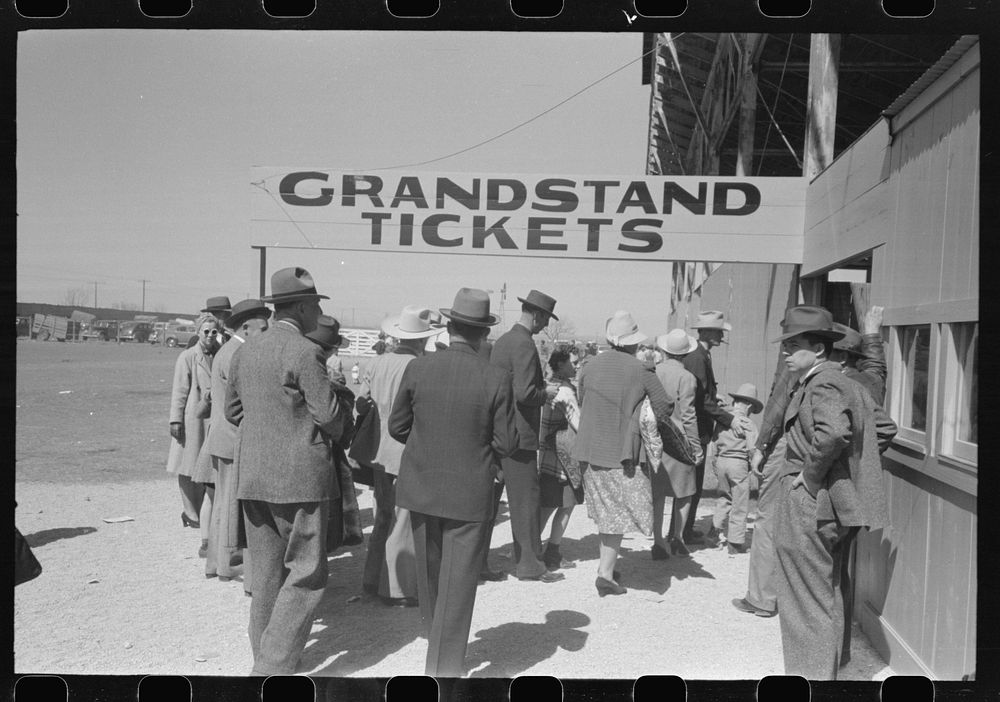 Spectators entering the grandstand to see the rodeo during the San Angelo Fat Stock Show, San Angelo, Texas by Russell Lee