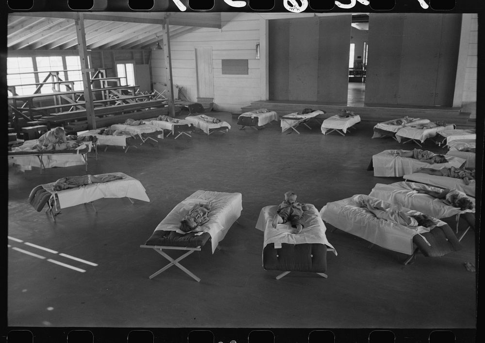 Children of the migratory laborers sleeping at the nursery school at the Agua Fria Migratory Labor Camp, Arizona by Russell…