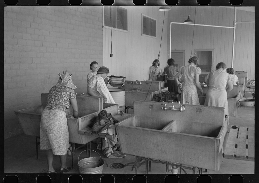 Wash day in the laundry room at the Agua Fria Migratory Labor Camp, Arizona by Russell Lee