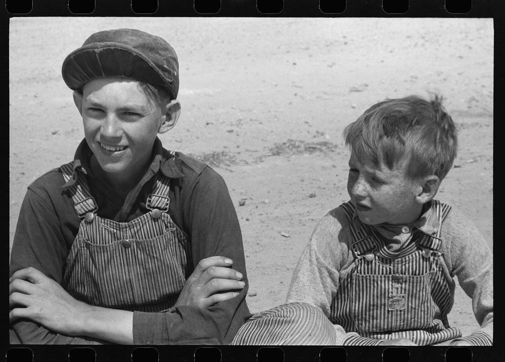 Children of migratory laborer at the Agua Fria Migratory Labor Camp, Arizona by Russell Lee