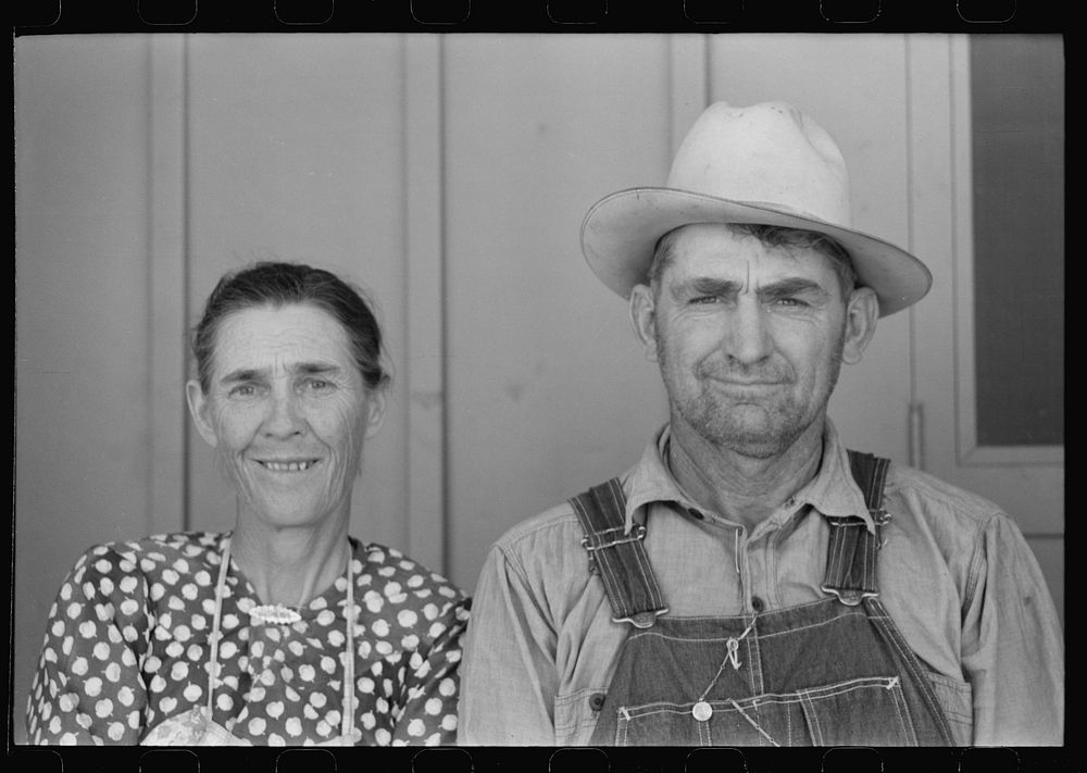 [Untitled photo, possibly related to: Migratory worker and his wife at the Agua Fria Migratory Labor Camp, Arizona] by…