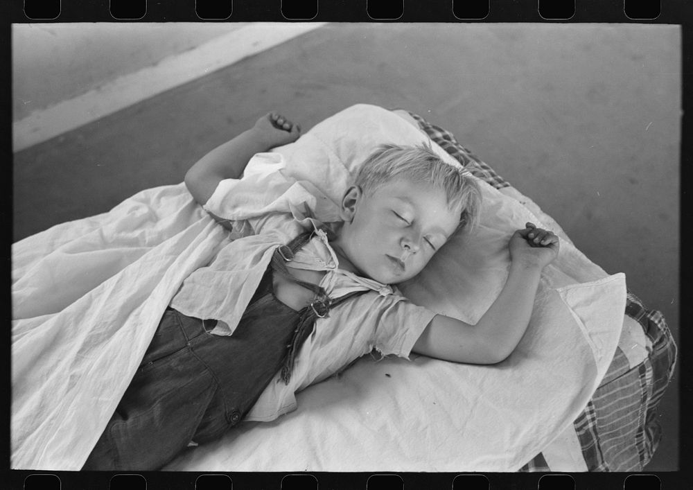 Little boy taking his nap at the Work Projects Administration nursery school at the Casa Grande Valley Farms, Pinal County…