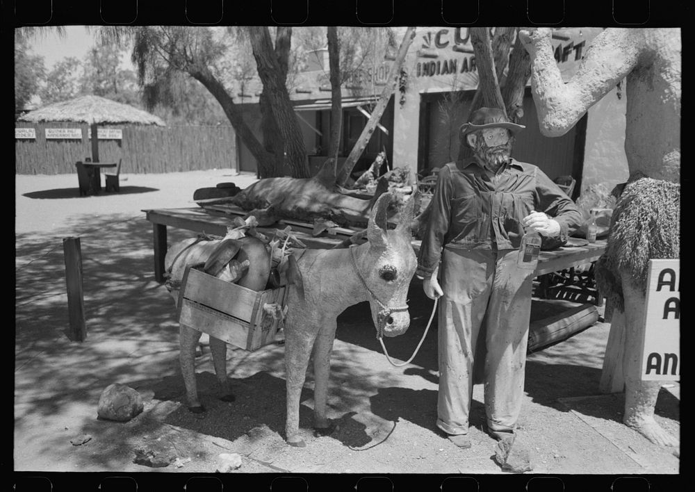 Figure of a miner and his donkey made of papier mache, Apache Junction, Arizona by Russell Lee