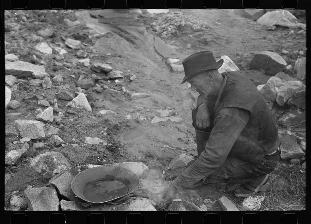 Gold prospector cooking mercury with dirty flour gold. The flour gold which is in small, almost powder flakes, will attach…