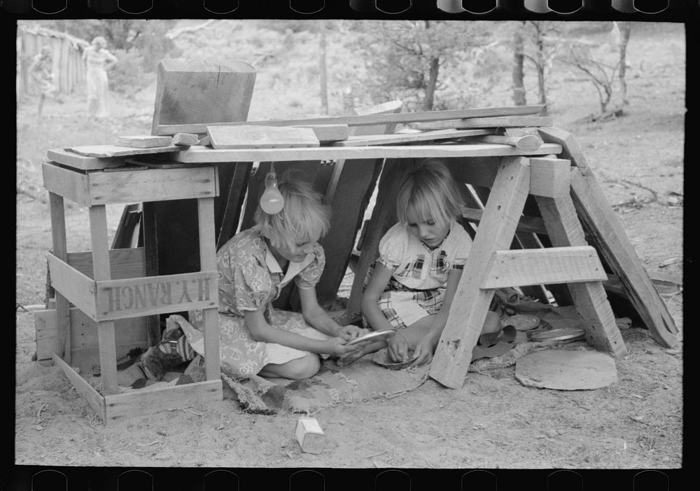The Whinery children playing in their house. Pie Town, New Mexico by Russell Lee
