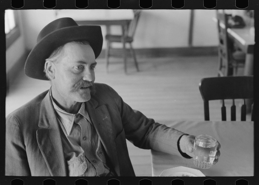 [Untitled photo, possibly related to: Farmer in cafe. Pie Town, New Mexico] by Russell Lee