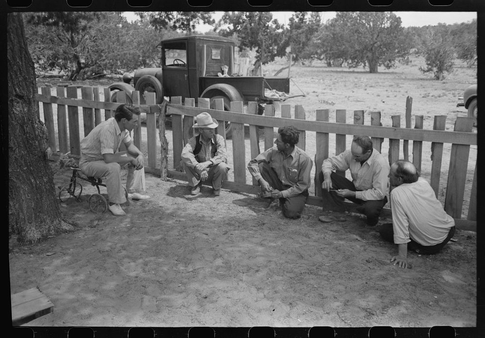 [Untitled photo, possibly related to: Homesteaders swap yarns at all day Sunday visiting. Pie Town, New Mexico] by Russell…