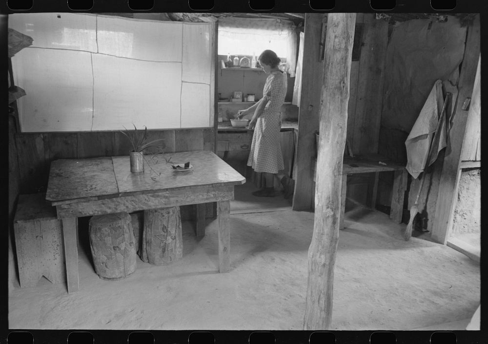Woman in adobe house, Pie Town, New Mexico by Russell Lee
