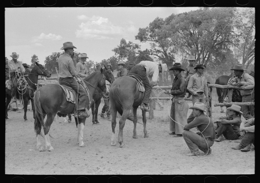 Cowboys on their horses at rodeo, Quemado, New Mexico by Russell Lee
