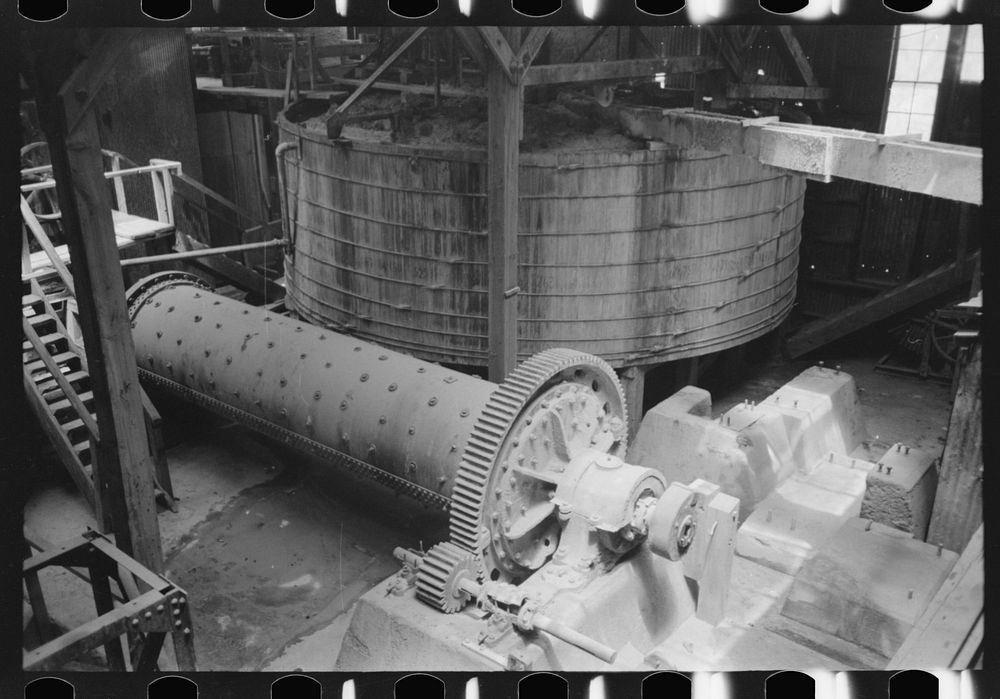[Untitled photo, possibly related to: Old tube mill in foreground with agitating tank in background. Gold mine at Mogollon…