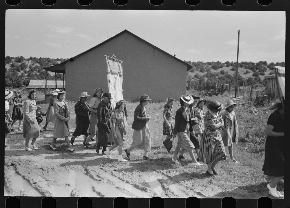 Procession of Spanish-American Catholics in honor of a saint, Penasco, New Mexico by Russell Lee