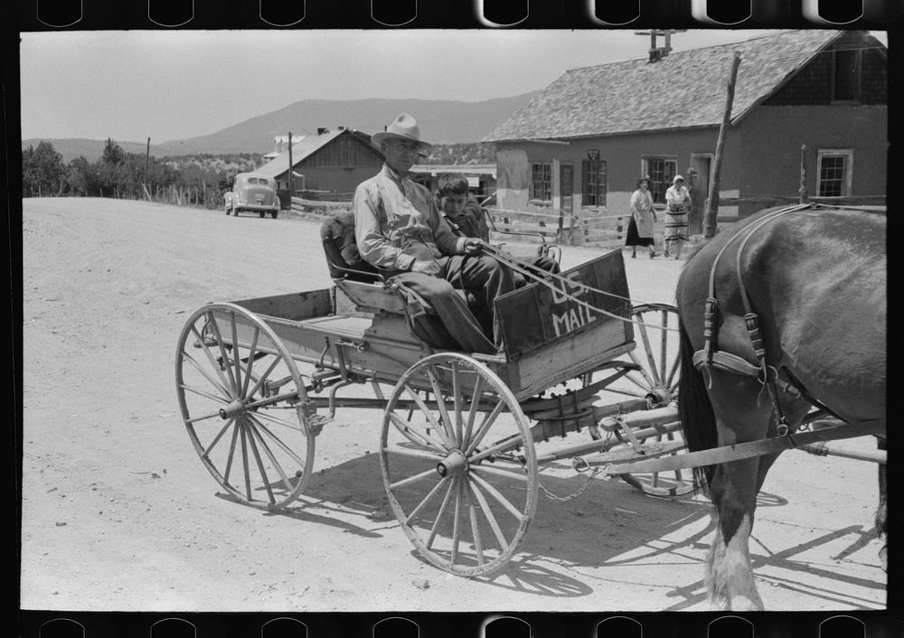 [Untitled photo, possibly related to: The mail for Penasco comes into town in this wagon. Penasco, New Mexico] by Russell Lee