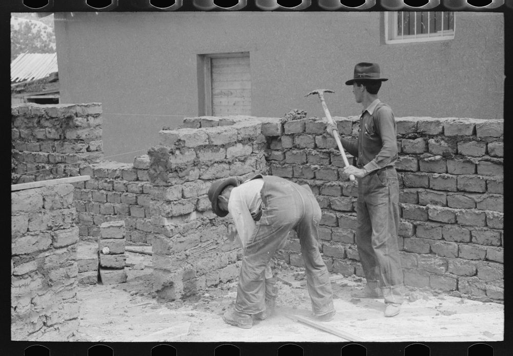 Constructing an adobe building, Penasco, New Mexico by Russell Lee