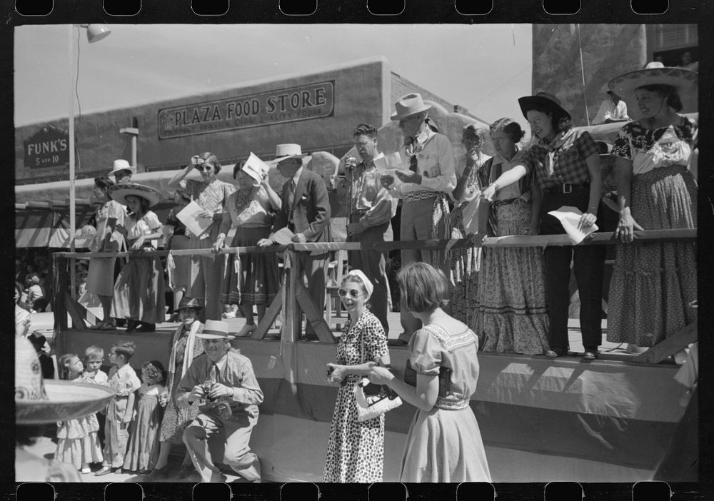 [Untitled photo, possibly related to: Crowds lined the streets and stood on top of covered sidewalks to see the dances at…