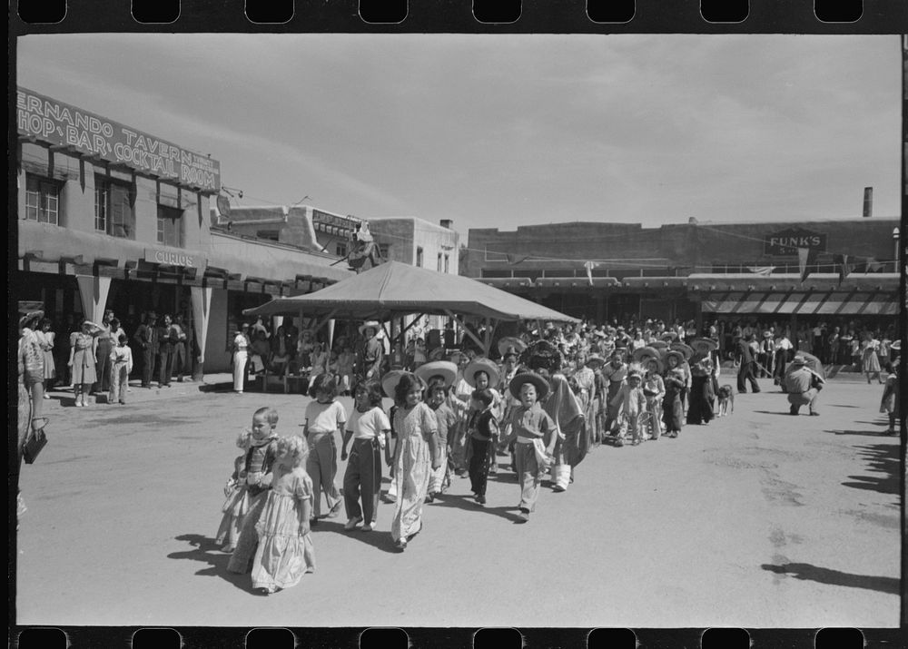 [Untitled photo, possibly related to: Parade on fiesta day, Taos, New Mexico] by Russell Lee