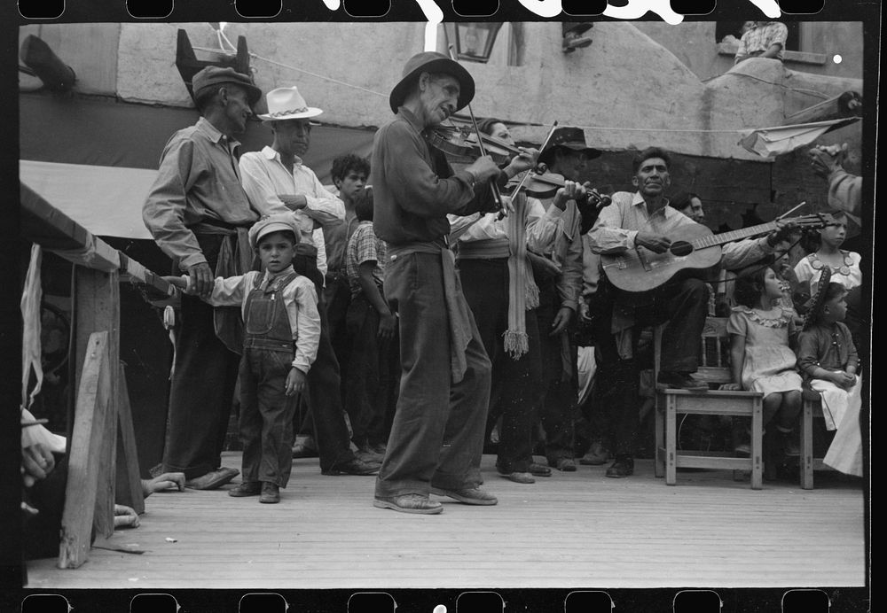[Untitled photo, possibly related to: Spanish-American musicians at fiesta, Taos, New Mexico] by Russell Lee