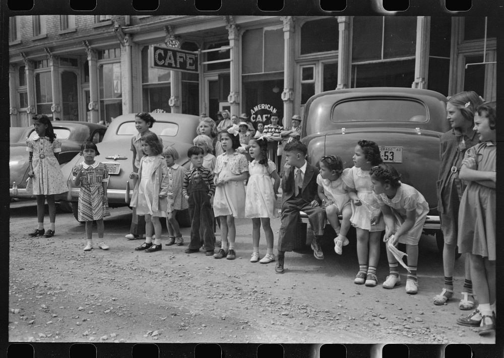 Children watching the Labor Day parade, Silverton, Colorado by Russell Lee