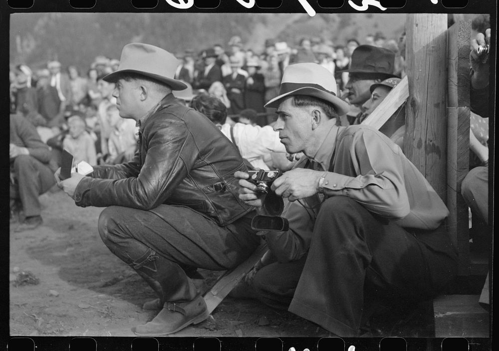 Candid cameraman at miners contest at Labor Day celebration, Silverton, Colorado by Russell Lee