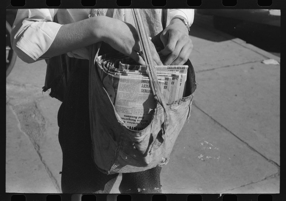 Newsboy's sack of papers, Montrose, Colorado by Russell Lee