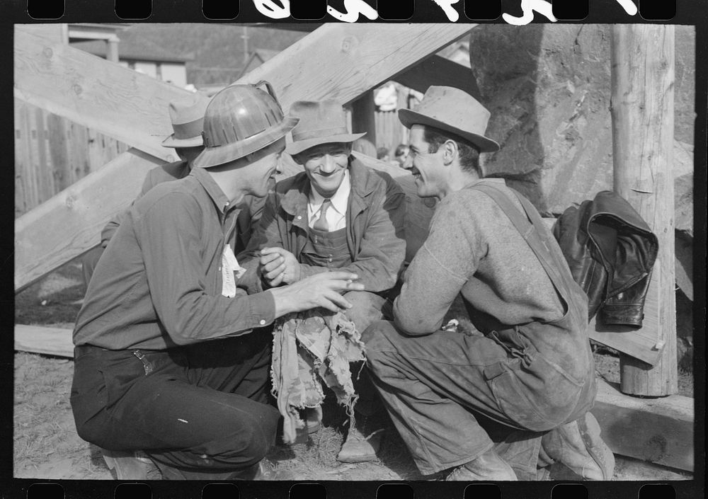 Miners talking at Labor Day celebration, Silverton, Colorado by Russell Lee