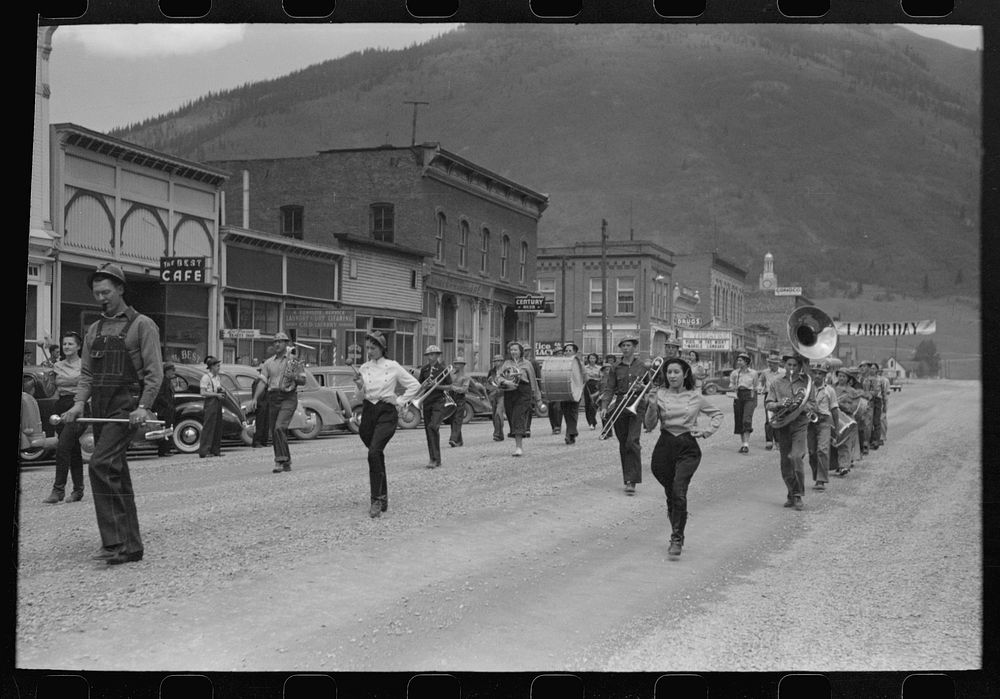 [Untitled photo, possibly related to: Band and clowns at Labor Day celebration, Silverton, Colorado] by Russell Lee