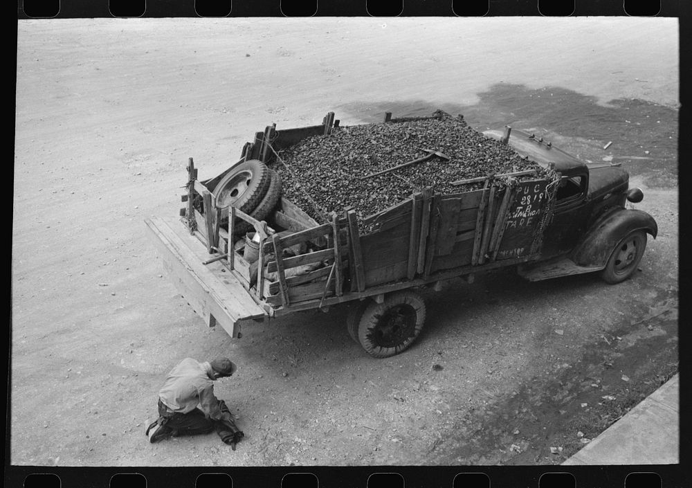 [Untitled photo, possibly related to: Unloading gravel to be used in mine building construction, Ouray County, Colorado] by…