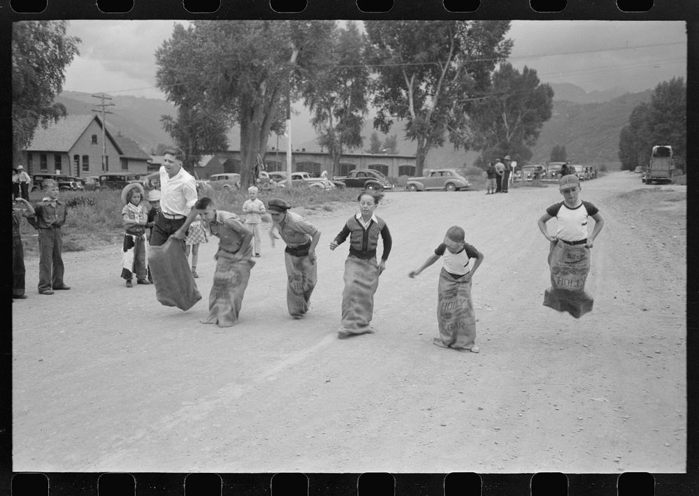 Boys' sack race, Labor Day celebration, Ridgway, Colorado by Russell Lee