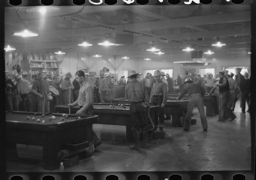 Construction workers playing pool in company commissary, Shasta Dam. Shasta County, California by Russell Lee