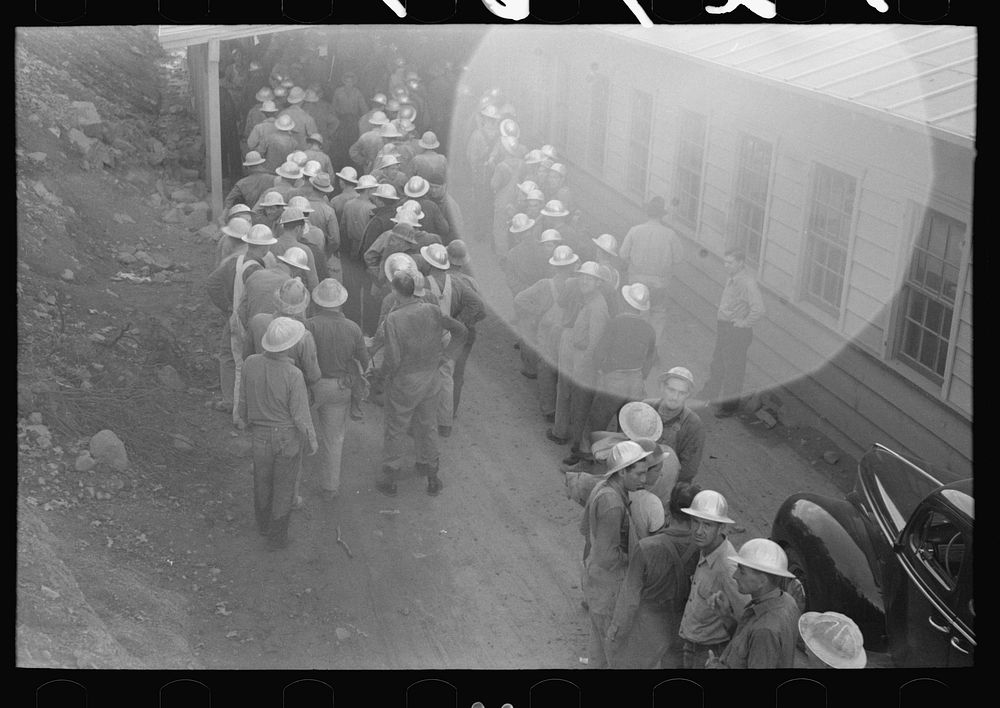 [Untitled photo, possibly related to: Construction workers lined up to be paid off, Shasta Dam, Shasta County, California]…