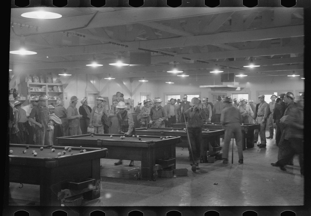 Construction workers playing pool in commissary, Shasta Dam, Shasta County, California by Russell Lee