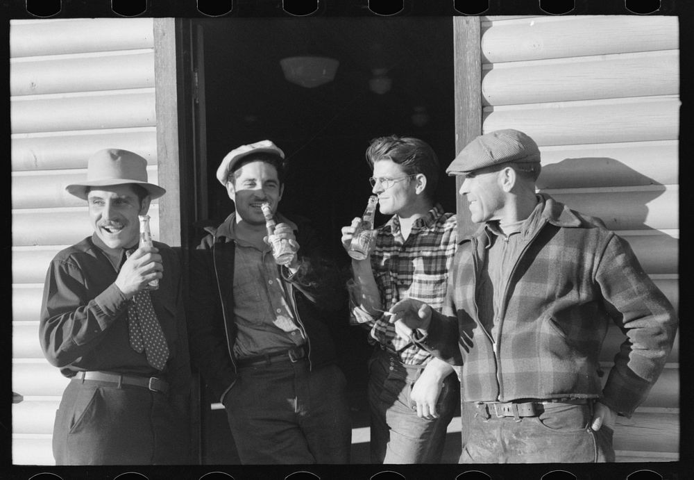 [Untitled photo, possibly related to: Shasta Dam construction workers drinking beer at entrance to bar. Central Valley…