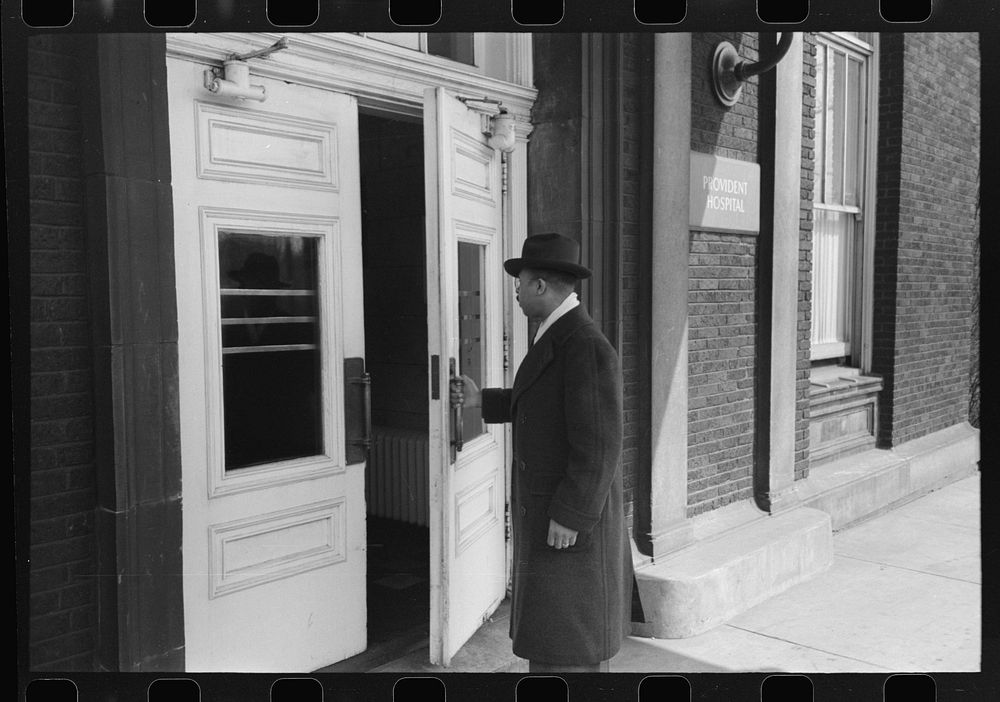 [Untitled photo, possibly related to: Doctor entering Provident Hospital, South Side of Chicago, Illinois] by Russell Lee