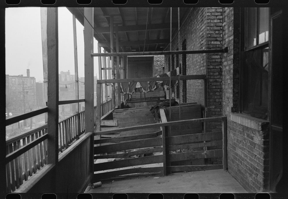 [Untitled photo, possibly related to: Back porches of apartment building in  section of Chicago, Illinois] by Russell Lee