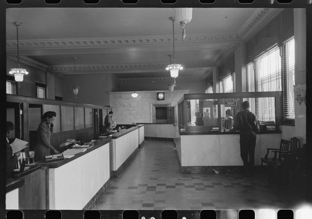 [Untitled photo, possibly related to: Front office of insurance company on South Side of Chicago, Illinois] by Russell Lee