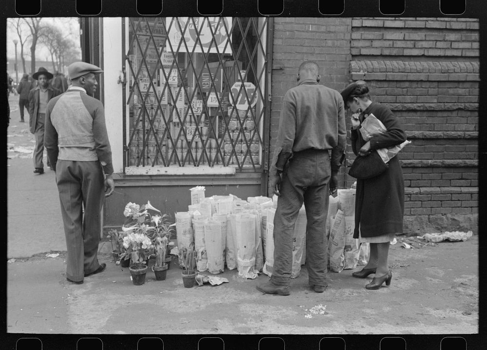 Selling Easter lilies on sidewalk on Easter morning, South Side of Chicago, Illinois by Russell Lee